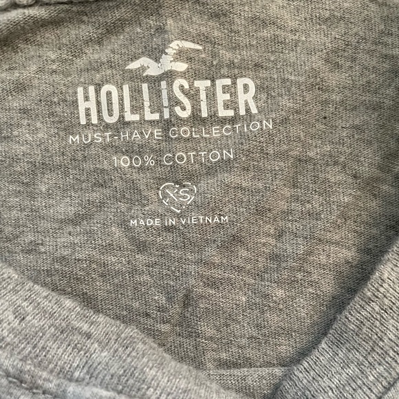 Hollister crop top. Grey with blue, yellow, red, and a white stripe. - Picture 3 of 3